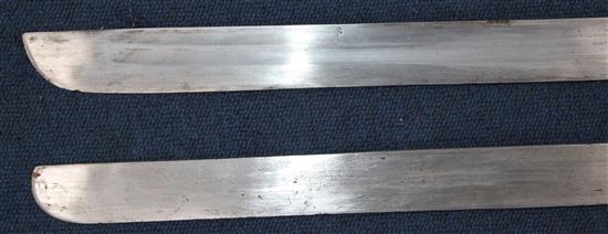 A Tibetan Dao or sword, largest 32.5in. incl. scabbard